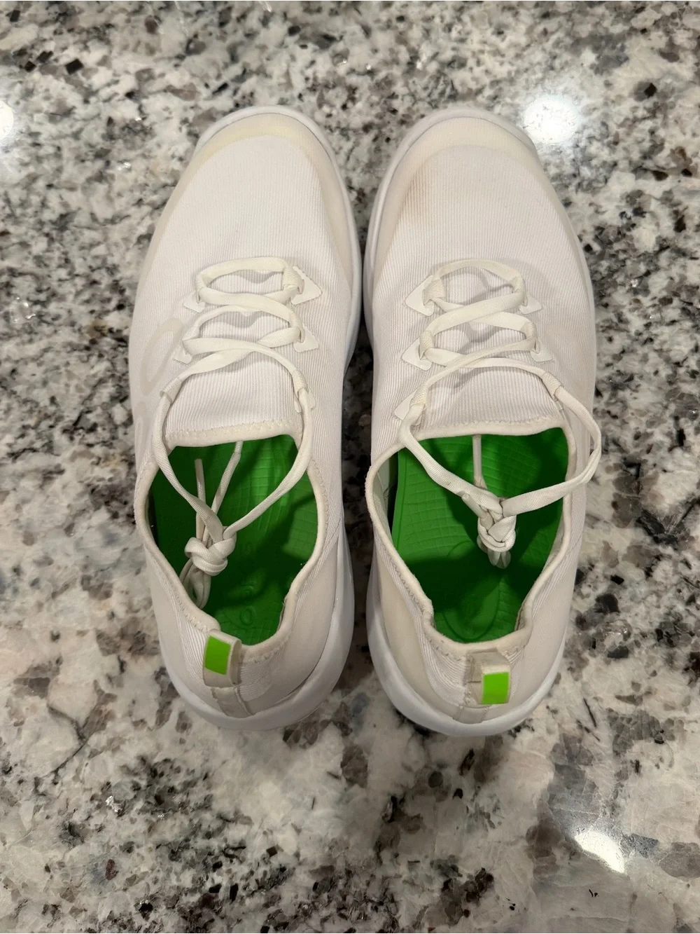 OOFOS Women's White Athletic Slip-On Sneakers with Green Insole Accent